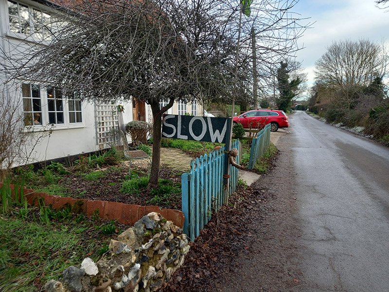Photo of a lane in Charsfield with cottages