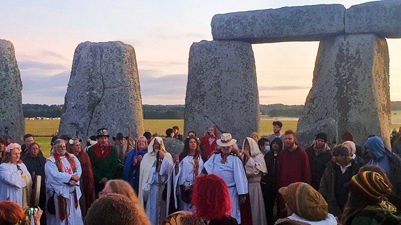 Druids and onlookers gathered at Stonehenge