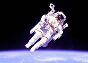 NASA astronaut above the Earth.