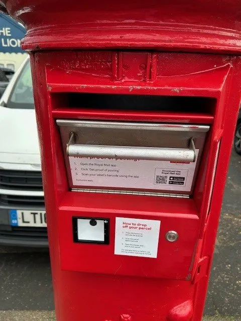 New type of postbox in Drayton. Under the usual letter slot it has a section one can pull open to drop in a larger parcel and instructions on using the system to record posting.