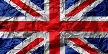 Crinkly Union flag: it's printed on paper that has been scrunched up and then straightened out.